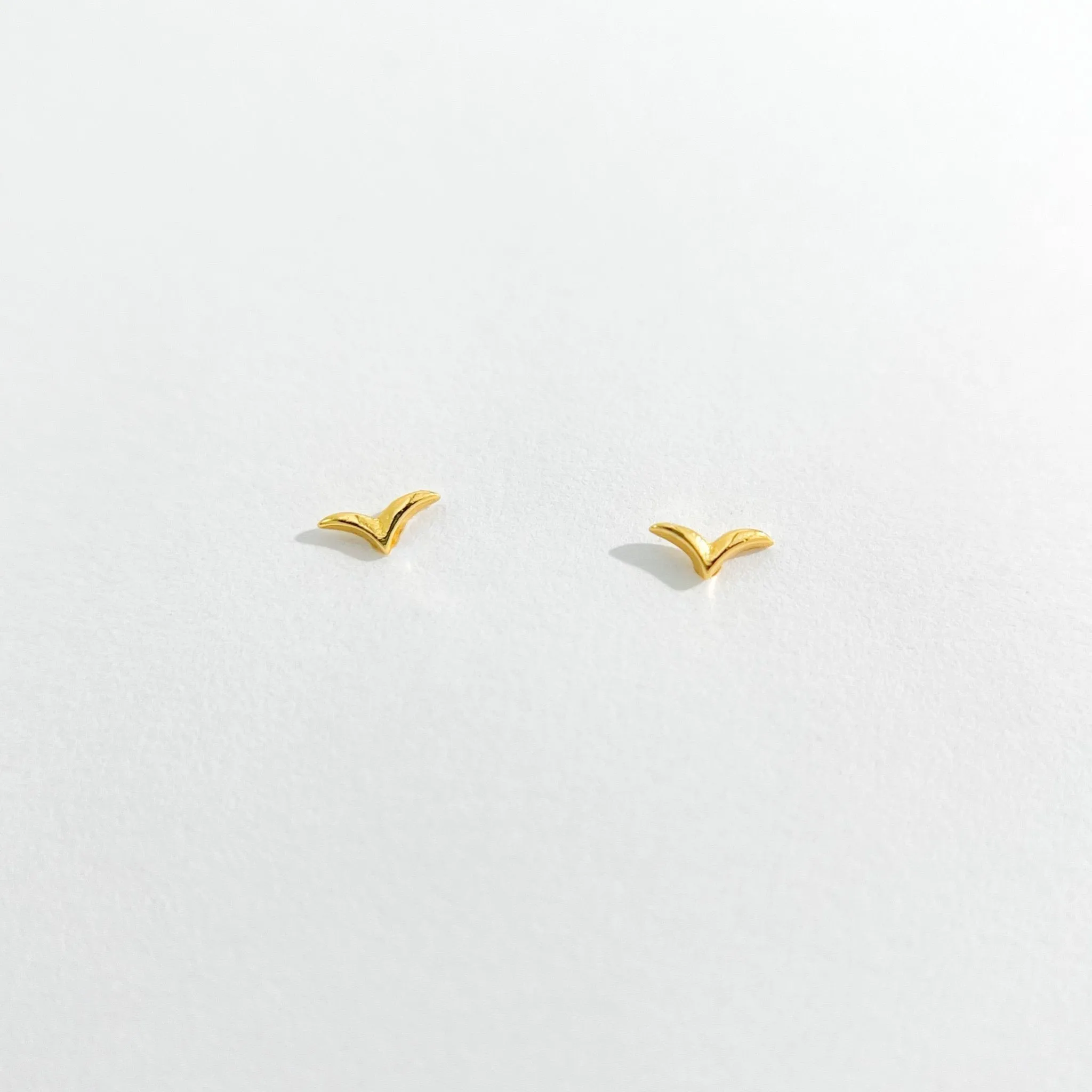 Micro Seagull Studs in Gold